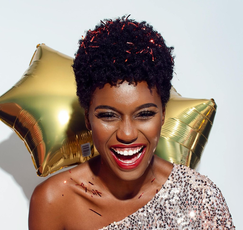 Woman laughing with a bright confident smile after a smile makeover